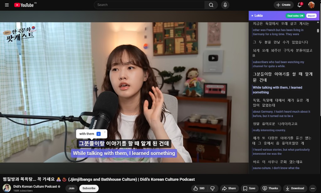 Lokia extension on YouTube with dual subtitles showing original and translated text